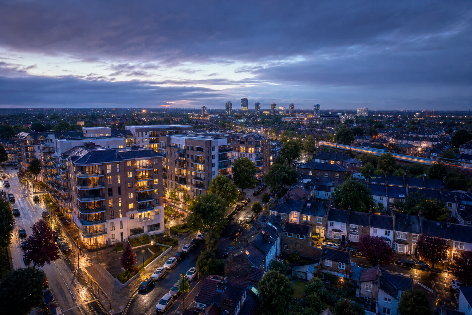 A polished twilight aerial of Slough with homes, town centre buildings and transport links