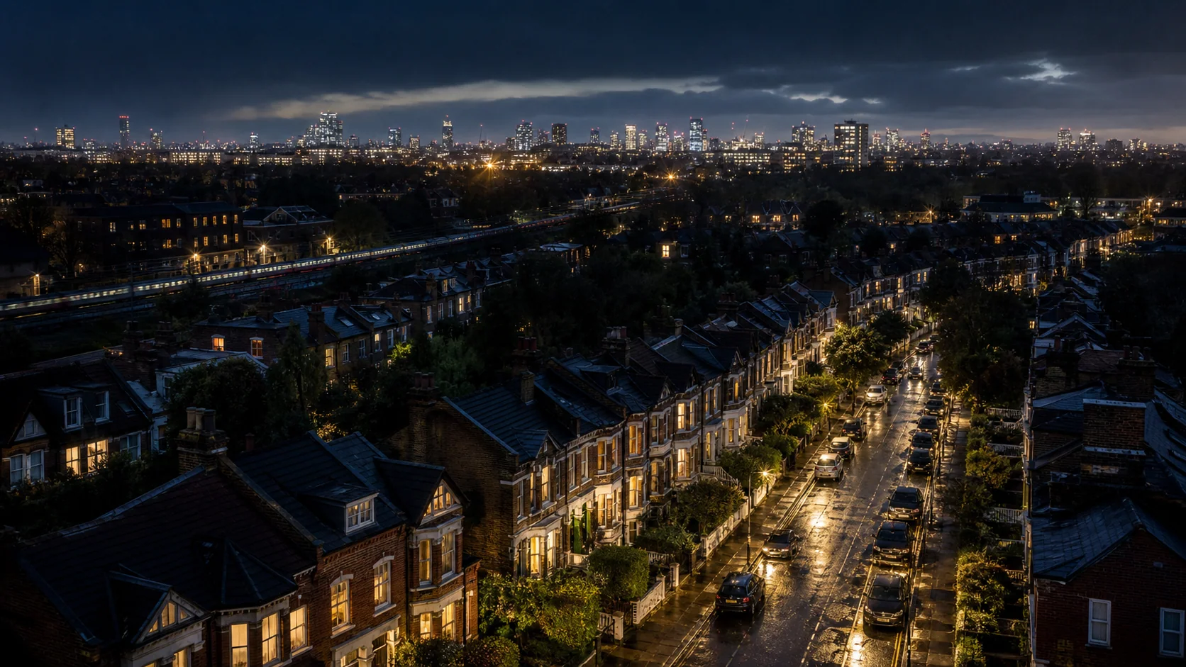 London homes and streets illuminated at night after rain.