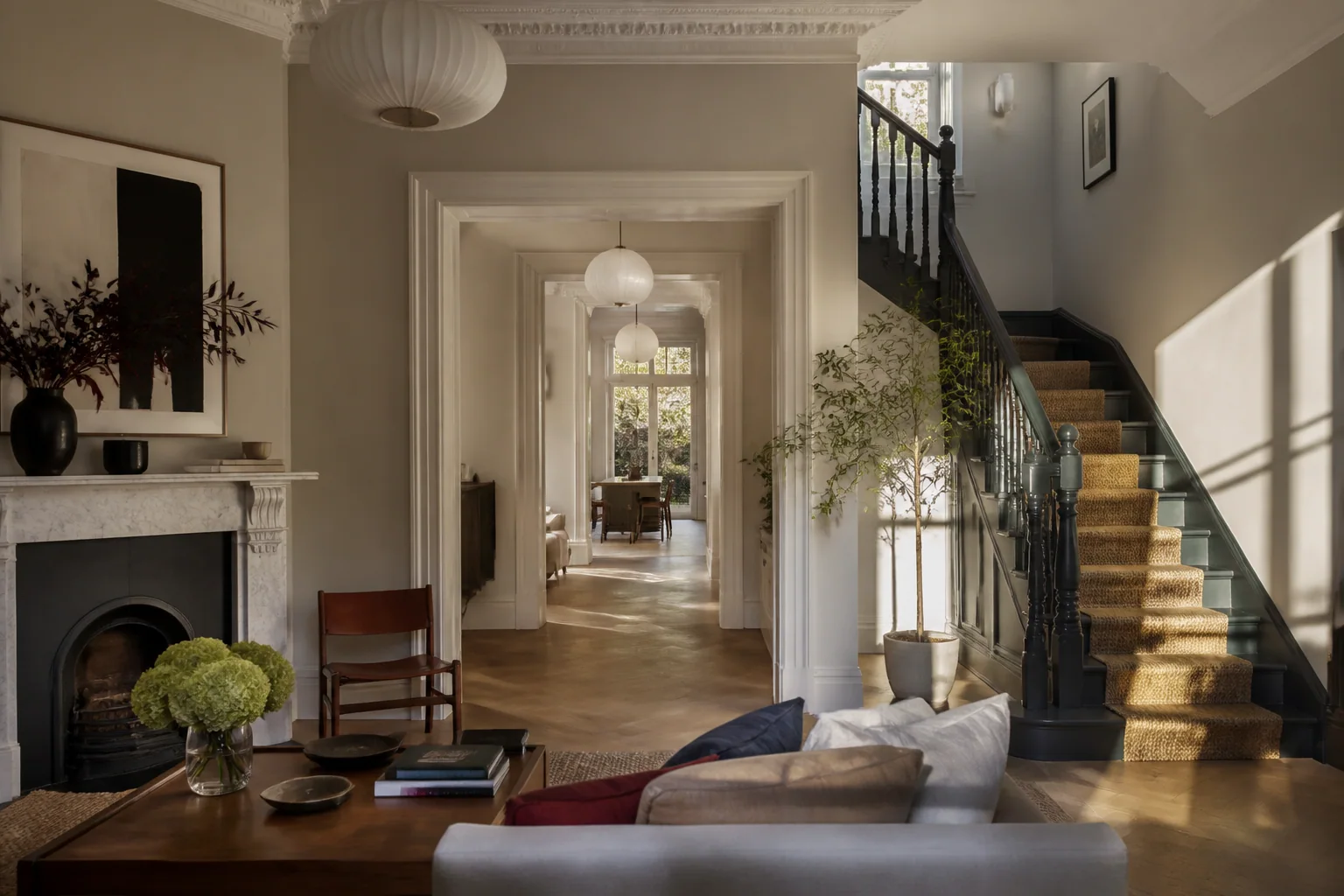 A refined British home interior lit by morning sun.